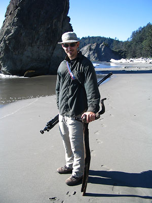 Sam finds a sportin walking stick on Rialto Beach