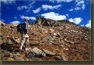Dave hiking up the south face of Hagues Peak